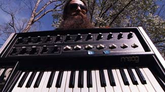 Evan Wilder with MicroMoog synthesizer